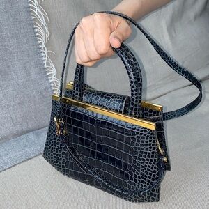 RULA GALAYINI. Mini handbag. Shiny croc